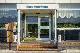Hotel Eingang Haus Waterkant Strandkorb
